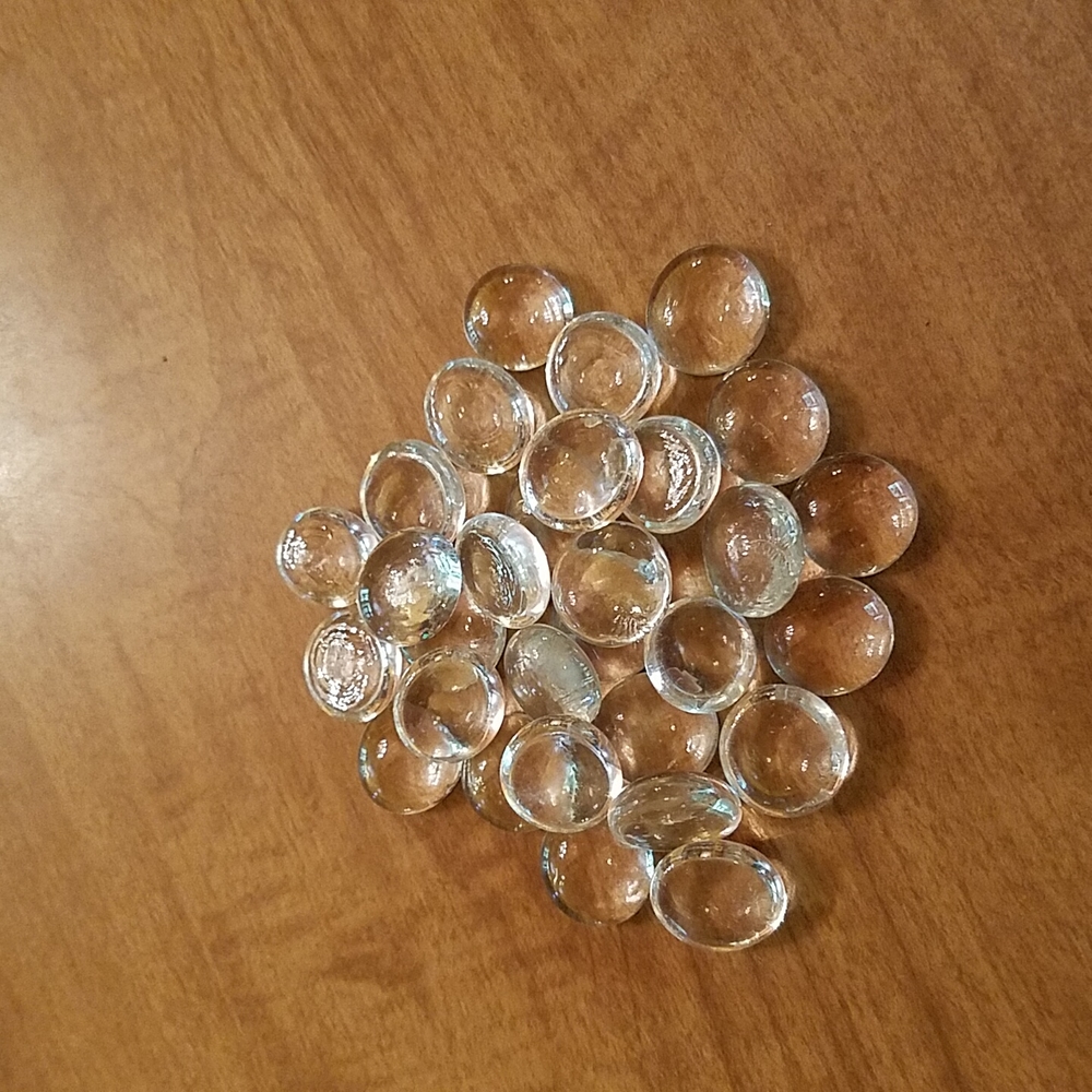30 smooth glass "pebbles" for vases or crafts.